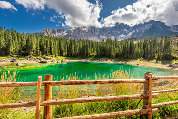 Wall Mural - aerial view of carezza lake in dolomites in summer, italy