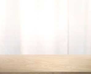 Wall Mural - in front of a wooden table with a glass wall, blurry glass in the background for editing products or