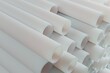 Plastic or polypropylene or polyethylene pipes, stack of round white profiles, technological industrial background, 3D rendering