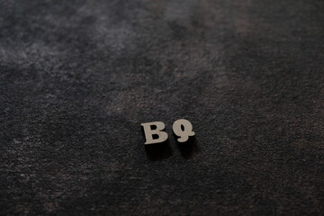 Wall Mural - the letters b and q above the dark field. initials bq