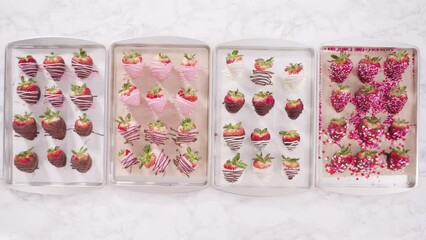 Sticker - Time lapse. Flat lay. Step by step. Variety of chocolate dipped strawberries on a parchment paper.