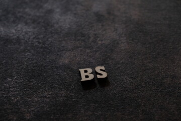 Wall Mural - the letters b and s above the dark field. initials bs