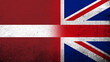 © Chernobrovin - National flag of United Kingdom (Great Britain) Union Jack with The Republic of Latvia National flag. Grunge background