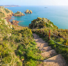 Steps Down To The Ocean Along The Beautiful Coastline Of Jersey Channel Islands