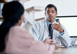 © N Felix/peopleimages.com - Doctor talking to patient in medical consultation, checkup and consult in clinic, hospital and healthcare center. Professional, gp and specialist worker explaining symptoms and side effects to woman