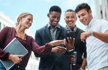 Poster - Young, diverse and creative design team and their manager looking at phone together outside from below. Female leader, boss or CEO showing new staff or interns the company website during orientation