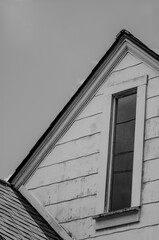 Arched Roof on an Old House with a Window.