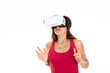 © OceanProd - Girl trying virtual reality goggles headset vr box positive modern woman