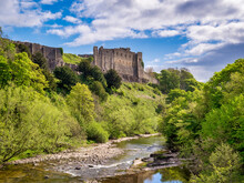 10 May 2022: Richmond, North Yorkshire, UK - The River Swale And Richmond Castle In Spring.