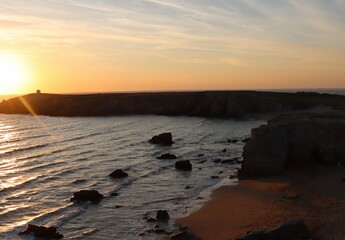 Canvas Print - sunset at the wild coast of the peninsula 