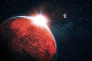 Wall Mural - amazing red planet mars with craters and beautiful sunset rays in space with stars and blue planet e