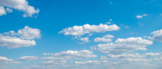 Wall Mural - blue sky background with white clouds