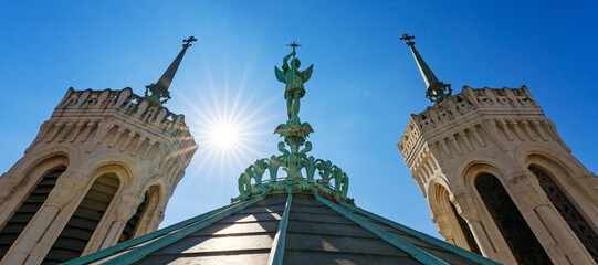 Wall Mural - View of Saint-Michel statue on the top of notre-dame-de-Fourviere basilica in Lyon