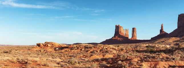 Desert Rocky Mountain American Landscape. Sunny Blue Sky Day. Oljato-Monument Valley, Utah, United States. Nature Background Panorama