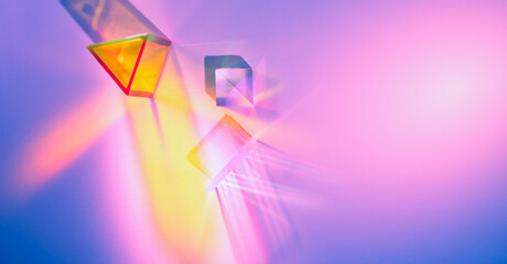 Wall Mural - Glass prisms and cubes with color spectrum rays. Abstract background with reflection and refraction of light. Shadow and rays of natural light effects..