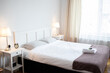 © Melinda Nagy - big bed in cozy white bedroom