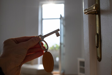 Sticker - key opening white door to a modern home