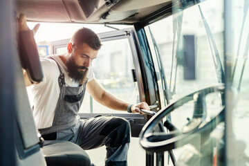 a driver entering truck.