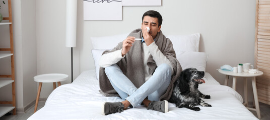 Canvas Print - Sick man with his dog at home