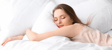 Beautiful Young Woman Sleeping In Bed