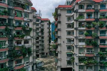 Wall Mural - Old communist ,brutalist apartment building in Cho lon  or Chinatown district of Ho Chi Minh City, Vietnam. 