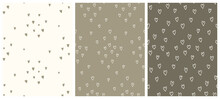 Cute Hand Drawn Vector Patterns With Tiny Green And Beige Hearts.