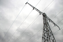 Transmission Line, Power Line Stand With Stormy Sky.