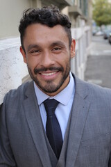 Wall Mural - Handsome ethnic businessman wearing suit and tie 