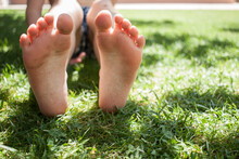 Feet On Grass