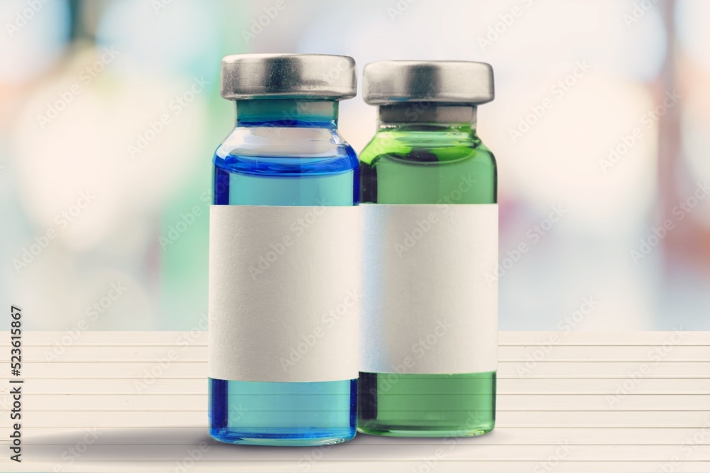 Liquid Injection Bar medical liquid for injection in a glass vial on the desk Stock Photo ...