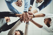 © Nola Viglietti/peopleimages.com - Team of business people hands stacked showing teamwork, collaboration and standing united for project development and innovation. Group of corporate colleagues joining in support and unity from below
