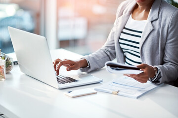 Aufkleber - Business woman typing on laptop, reading from notebook and planning a strategy in an office at work. Corporate employee, manager or boss sending emails, completing a proposal and browsing internet