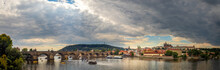 Waterfront View Across The River Vltava To Castle, Charles Bridge And Petrin Lookout Tower, Prague, Czech Republic