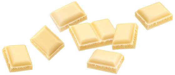 Wall Mural - white milk chocolate pieces isolated on white background