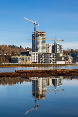 Wall Mural - Construction of a New Residential Area on the Banks of the Fraser River and marina in Vancouver City