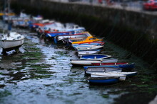 Miniature Look, Boats In Harbor At Low Tide