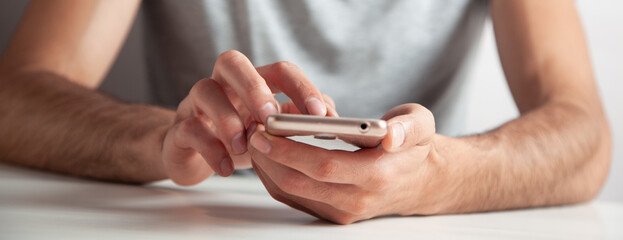 Canvas Print - male hands using smartphone