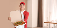 Banner With Male Courier Holding Box With Tasty Pizza