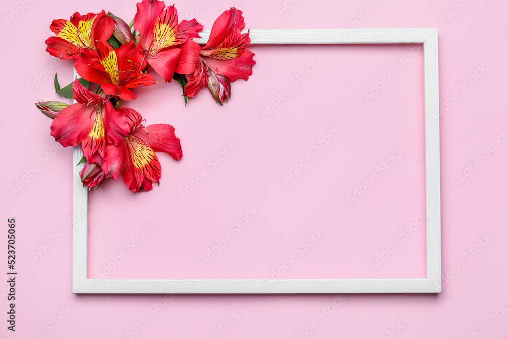 Composition with empty picture frame and alstroemeria flowers on color background