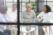 © Katsiaryna - discussion of successful business people in the office