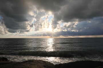 Wall Mural - picturesque view of sky with heavy rainy clouds over sea