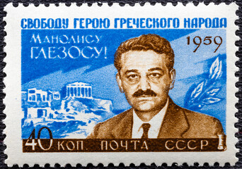 Wall Mural - USSR - CIRCA 1959: a post stamp printed in USSR shows portrait of Manolis Glezos and dedicated to the National Liberation Front EAM , circa 1959