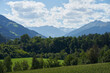 View on alp mountains peaks through valley in Austria