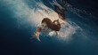 A girl with long dark hair swims underwater as if flying