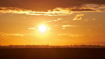 Wall Mural - Evening sky with setting sun through clouds at sunset, cloudy landscape