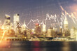© Pixels Hunter - Abstract virtual financial graph hologram on blurry skyline background, forex and investment concept. Multiexposure
