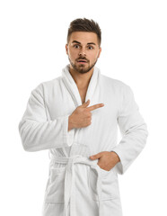 Canvas Print - Handsome man wearing bathrobe on white background