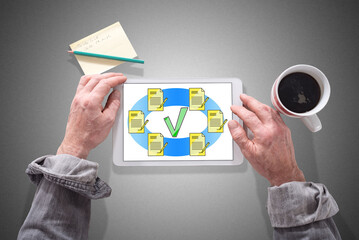 Canvas Print - Document validation concept on a tablet