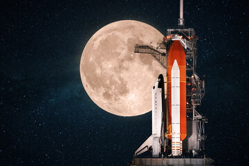 Canvas Print - beautiful space shuttle prepares for launch against the backdrop of an amazing full moon in the starry sky. Space mission, concept.