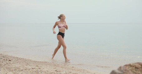 Wall Mural - Teen Girl Running On The Beach